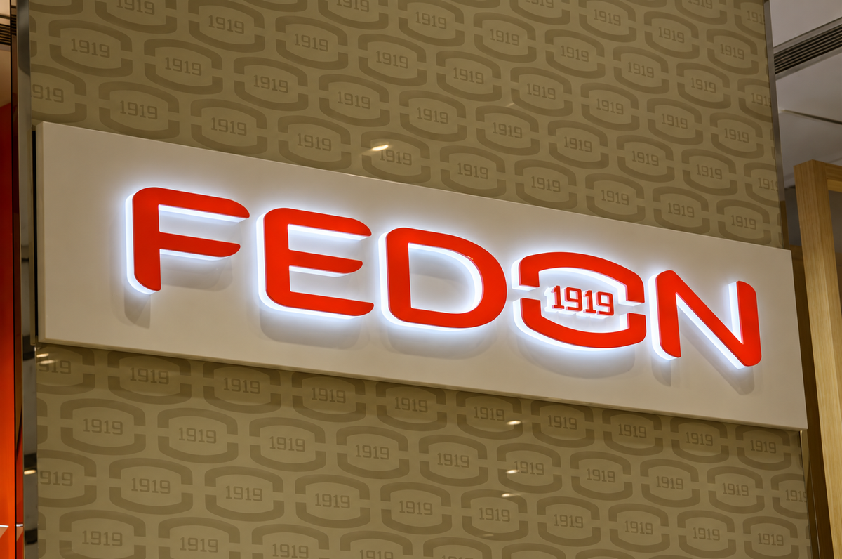 Custom company logo illuminated through its front face and sides