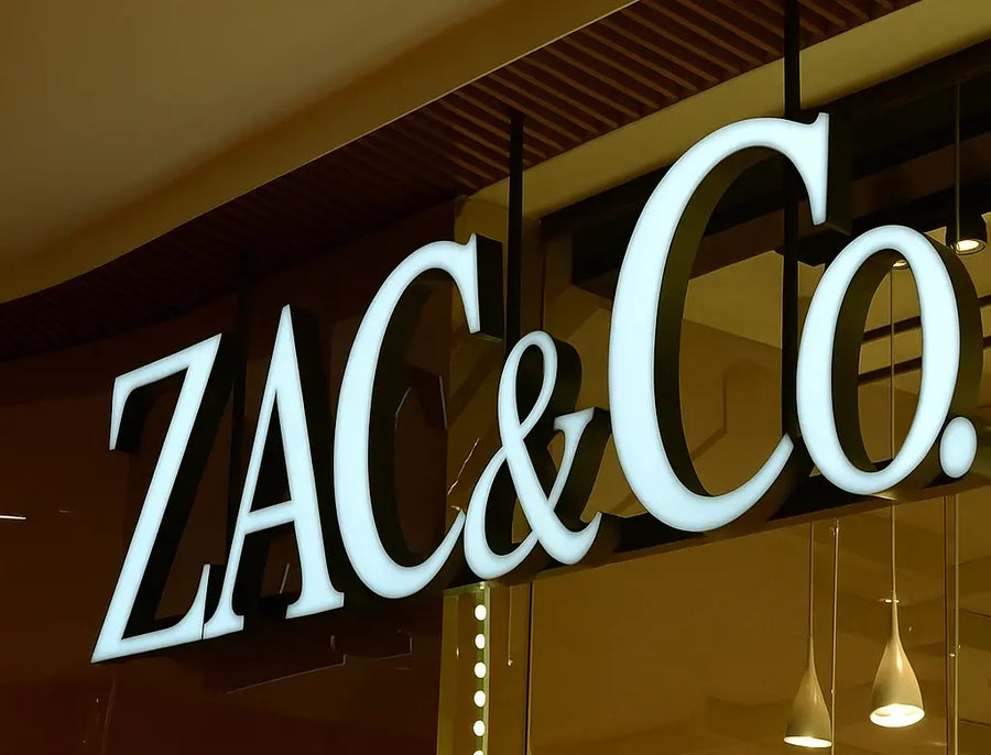 Custom illuminated logo sign designed from business artwork