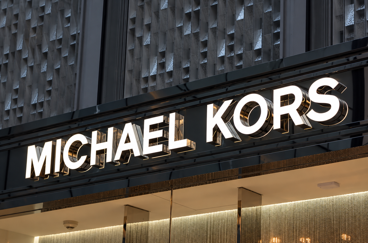 Front-lit acrylic business letters installed above a commercial entrance