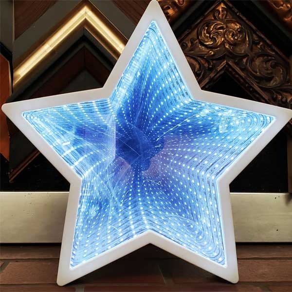 Wall-mounted infinity mirror business sign inside a commercial reception area